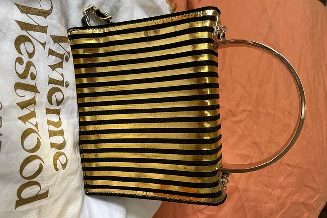 Vivienne westwood gold clutch on sale bag