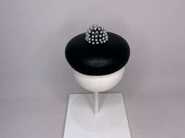 For Rent: Black oversized Leather Button with Pearl Pom Pom detail