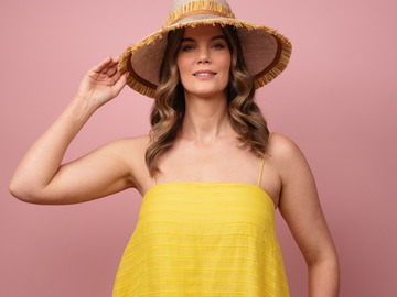 For Sale: Moraka natural straw wide brimed hat with tassel trim edge S